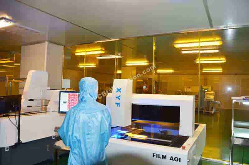 Technicians inspecting high-precision circuit boards